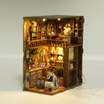 Load image into Gallery viewer, Midnight Magic Book Nook Kit with potion shelves floating spellbook and witch workshop
